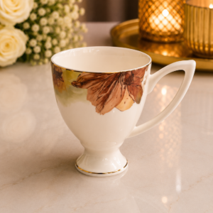Elegant white ceramic floral mug set with brown flower design and premium gold rim.